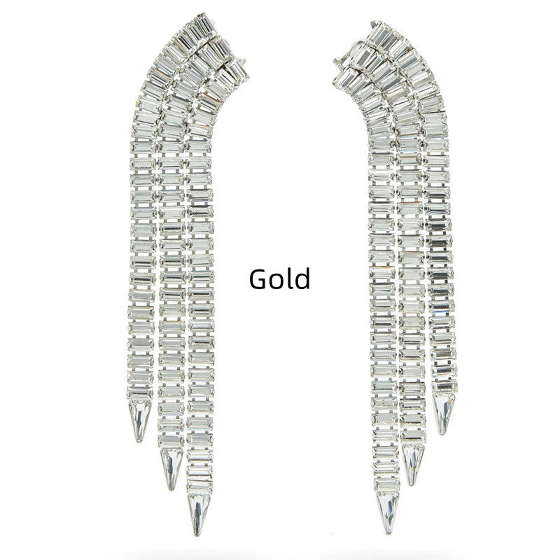 Dazzling Allure : ZIRCONIA TASSEL EARRINGS FOR FASHION-FORWARD WOMEN